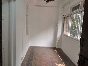 Living Room in 1 BHK Apartment at Khar West – for Rent