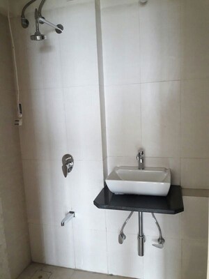 Bathroom in 2 BHK Apartment at Swaroop Marvel Gold, Bhandup West – for Sale