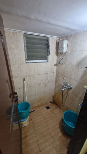 Bathroom in 1 BHK Apartment at Sankalp Nnp, Goregaon East – for Rent