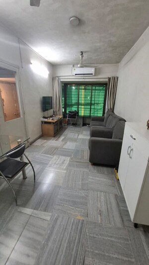 Living Room in 1 BHK Apartment at Evening Glory, Chandivali – for Rent