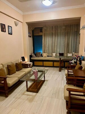 Living Room in 1.5 BHK Apartment at Bandra West – for Rent