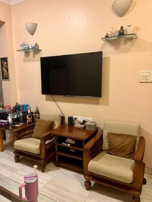 Living Room in 1.5 BHK Apartment at Bandra West – for Rent