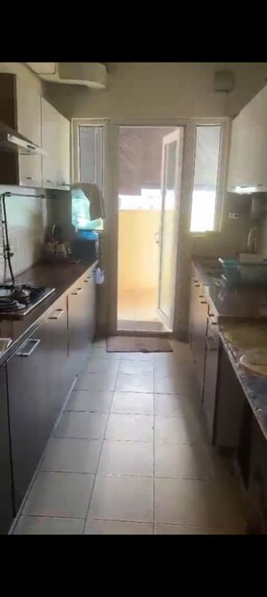 Kitchen in 4 BHK Apartment at Mahagun Moderne, Sector 78 – for Sale