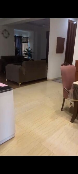 Living Room in 4 BHK Apartment at Mahagun Moderne, Sector 78 – for Sale