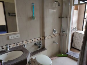 Bathroom in 2 BHK Apartment at K Raheja Palm Court, Malad West – for Rent