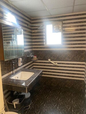 Bathroom in 3.5 BHK Apartment at Paramount Floraville, Sector 137 – for Sale