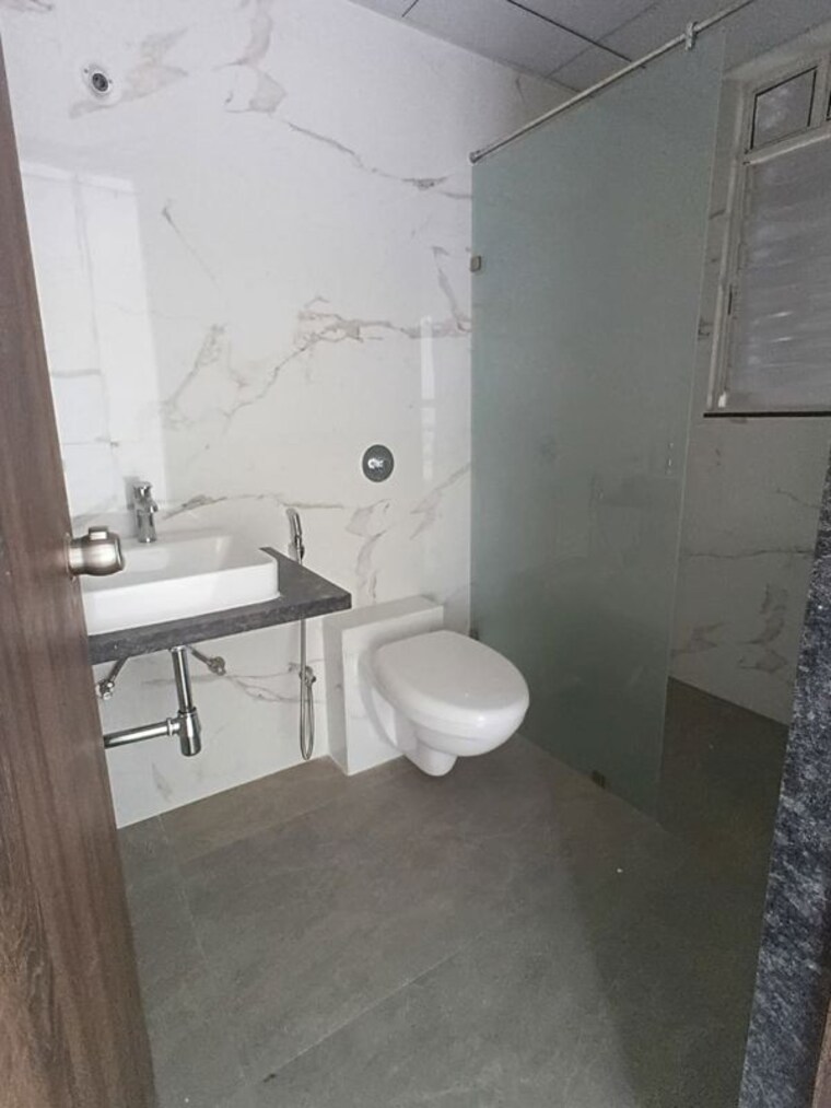 Bathroom, goel-ganga-serio-e-f-building 3 Bedroom 1069 Sq.Ft. Apartment In Kharadi Pune 10152157