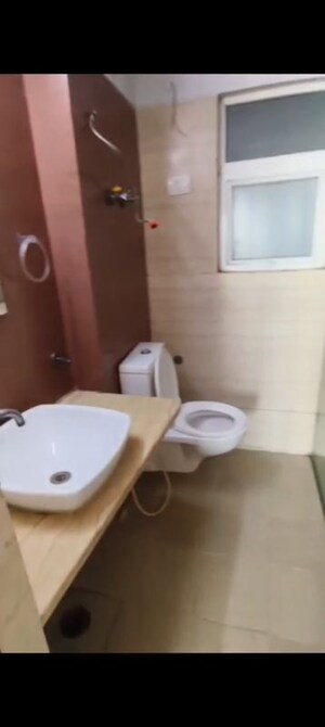 Bathroom in 3 BHK Apartment at Mahagun Moderne, Sector 78 – for Sale