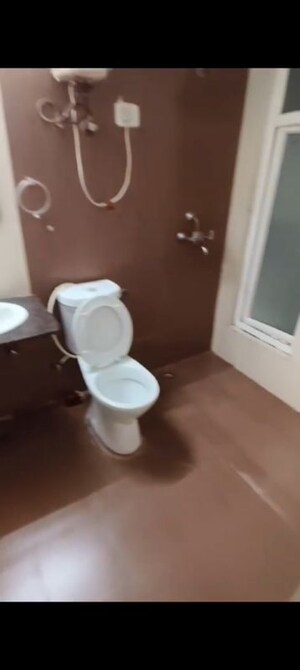 Bathroom in 3 BHK Apartment at Mahagun Moderne, Sector 78 – for Sale