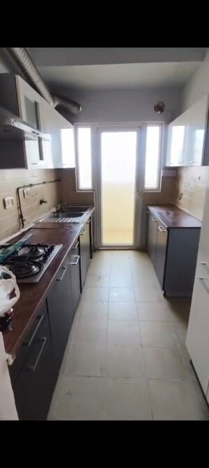 Kitchen in 3 BHK Apartment at Mahagun Moderne, Sector 78 – for Sale
