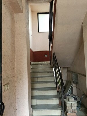 Staircase in Studio Independent House at Thergaon – for Rent