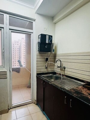 Kitchen in 3.5 BHK Apartment at Amrapali Silicon City, Sector 76 – for Sale