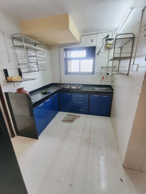 Kitchen in 3 BHK Apartment at Vaibhav Vilas CHS, Majiwada – for Rent