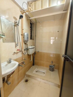 Bathroom in 1 BHK Apartment at Raunak Unnathi Greens, Kasarvadavali – for Rent