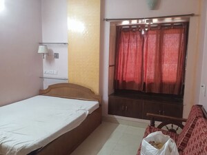 Bedroom in 1 BHK Apartment at Satellite Garden, Goregaon East – for Rent