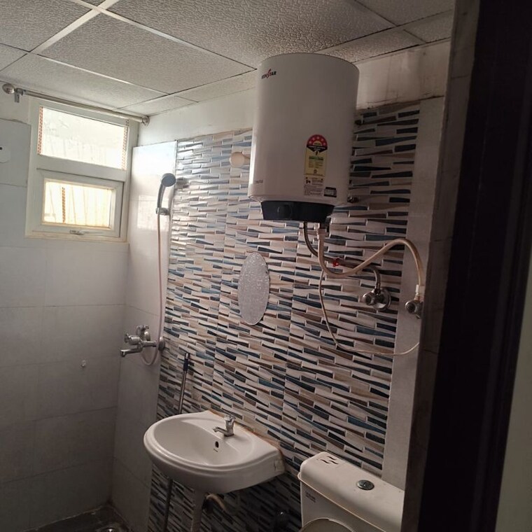 Bathroom, signature-global-the-roselia 2 Bedroom 670 Sq.Ft. Apartment In Sector 95a Gurgaon 10152486