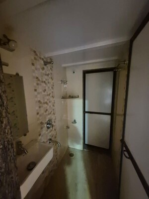 Bathroom in 2 BHK Apartment at Anant Bhuvan, Naupada – for Rent