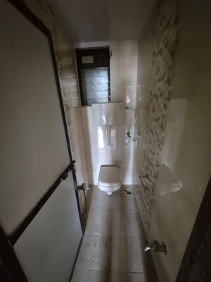 Bathroom in 2 BHK Apartment at Anant Bhuvan, Naupada – for Rent