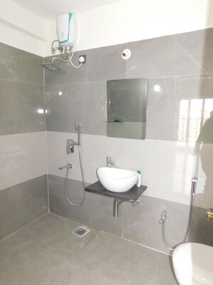 Bathroom in 3 BHK Apartment at Dhoot Sky Residency New Sonali CHSL, Malad West – for Rent