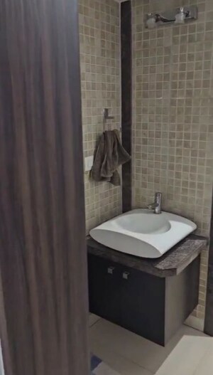 Bathroom in 3 BHK Apartment at Regency Cosmos, Baner – for Rent