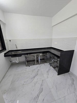 Kitchen in 2 BHK Apartment at Wadgaon Sheri – for Rent