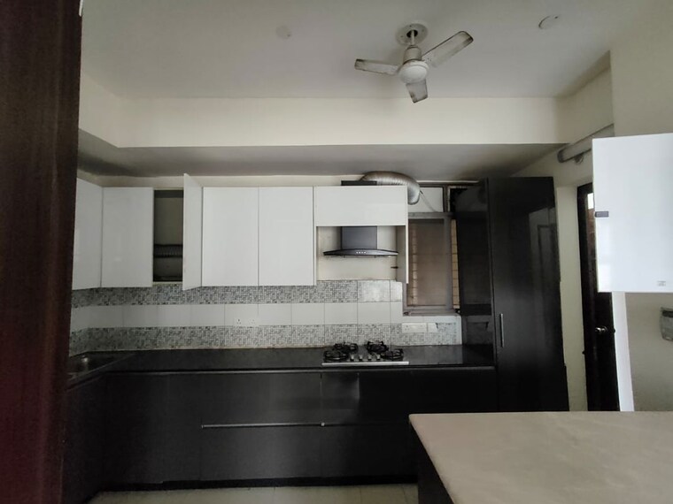 Kitchen, unitech-uniworld-gardens-2 3 Bedroom 1355 Sq.Ft. Apartment In Sector 47 Gurgaon 10152987