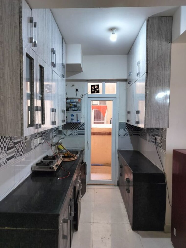 Kitchen, signature-the-serenas 2 Bedroom 614 Sq.Ft. Apartment In Sohna Sector 36 Gurgaon 10152989