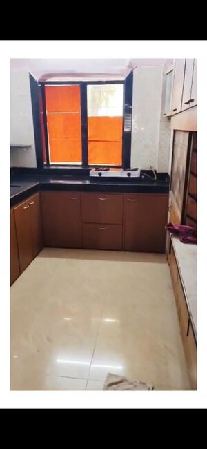 Kitchen in 2 BHK Apartment at Royal Classic Co Op Society, Andheri West – for Rent
