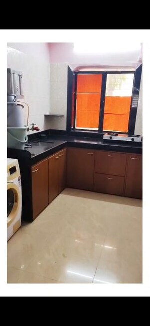 Kitchen in 2 BHK Apartment at Royal Classic Co Op Society, Andheri West – for Rent