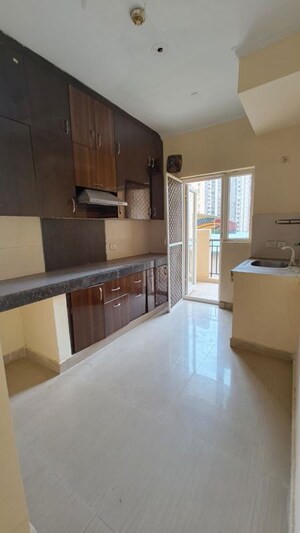 Kitchen in 3 BHK Apartment at Paramount Floraville, Sector 137 – for Sale