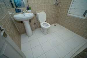 Bathroom in 5 BHK Builder Floor at Vatika India Next, Sector 82 – for Sale