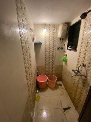 Bathroom in 2 BHK Apartment at Woodland Apartment, Andheri West – for Rent