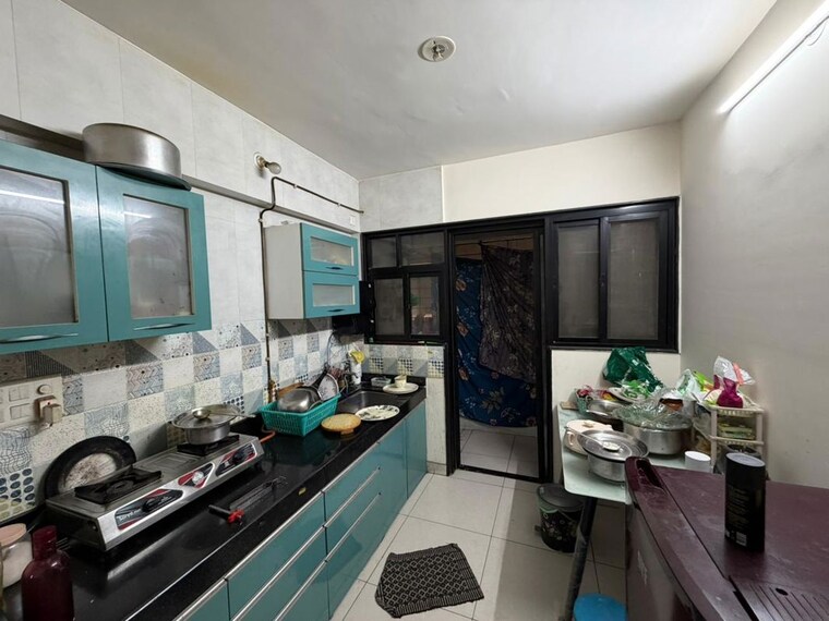 Kitchen, magarpatta-nova 2 Bedroom 622 Sq.Ft. Apartment In Mundhwa Pune 10153580
