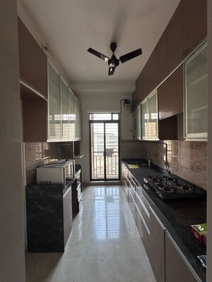 Kitchen in 3.5 BHK Apartment at Harmony Signature Towers, Owale – for Sale
