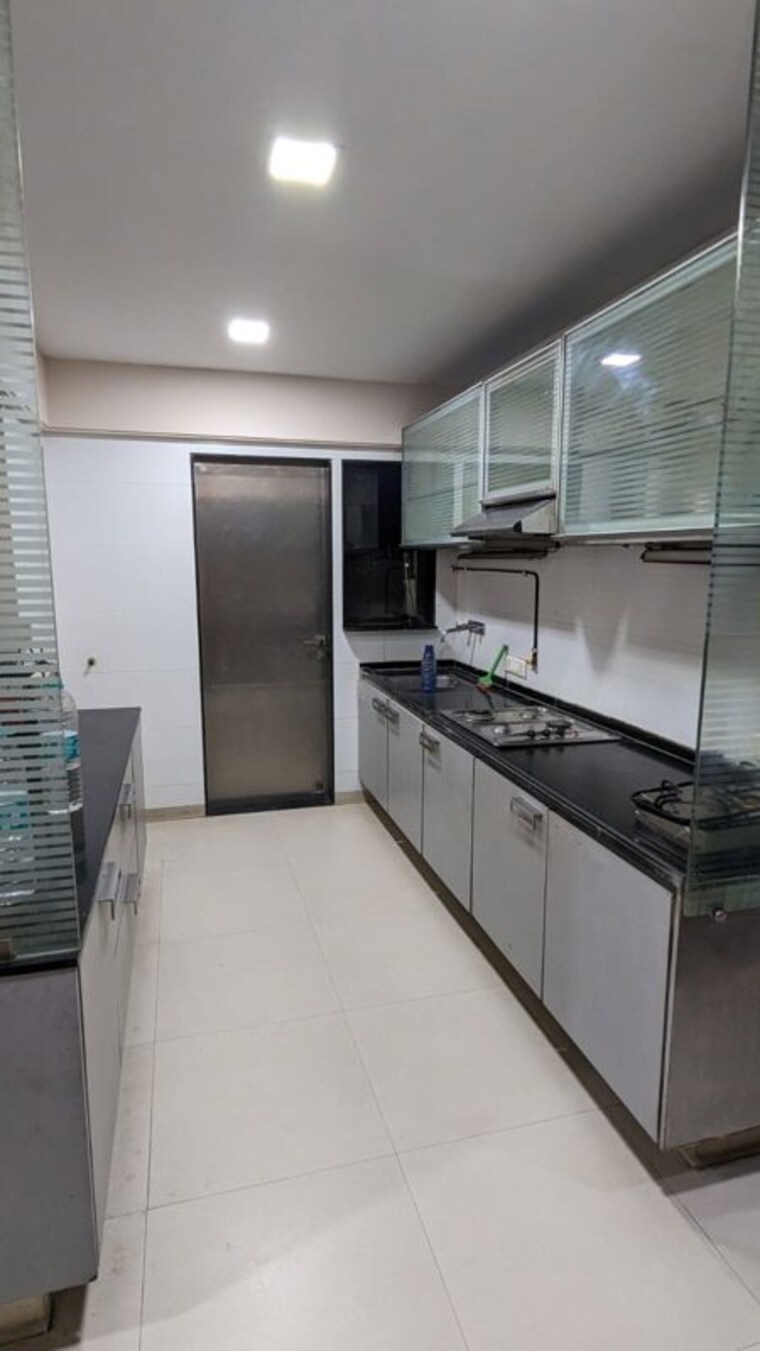Kitchen, tharwani-heights 2 Bedroom 850 Sq.Ft. Apartment In Sanpada Navi Mumbai 10153893