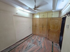 Bedroom in 2 BHK Apartment at Arjun CHS Vasant Vihar, Vasant Vihar – for Sale