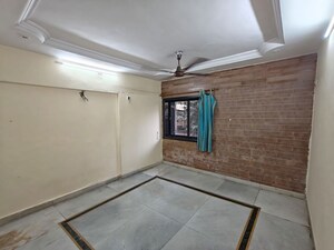 Bedroom in 2 BHK Apartment at Arjun CHS Vasant Vihar, Vasant Vihar – for Sale