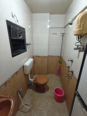 Bathroom in 2 BHK Apartment at Arjun CHS Vasant Vihar, Vasant Vihar – for Sale