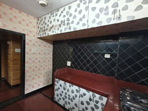 Kitchen in 2 BHK Apartment at Arjun CHS Vasant Vihar, Vasant Vihar – for Sale