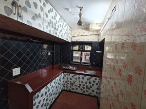 Kitchen in 2 BHK Apartment at Arjun CHS Vasant Vihar, Vasant Vihar – for Sale