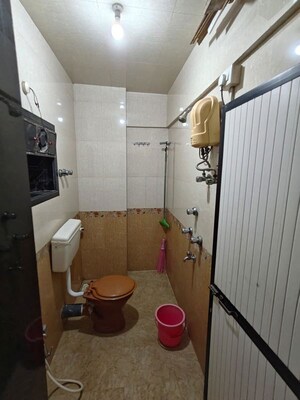 Bathroom in 2 BHK Apartment at Arjun CHS Vasant Vihar, Vasant Vihar – for Sale