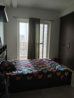 Bedroom in 2 BHK Apartment at Ajnara Ambrosia, Sector 118 – for Rent