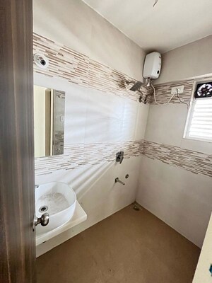Bathroom in 1 BHK Apartment at JVM Corner Stone, Naupada – for Sale