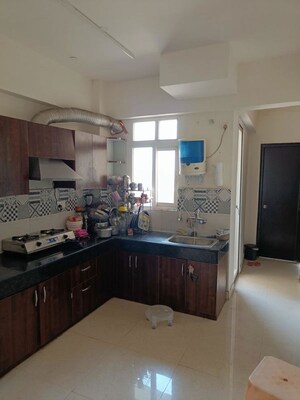 Kitchen in 2 BHK Apartment at Signature The Serenas, Sohna Sector 36 – for Rent