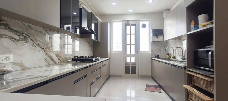 Kitchen, artique-uptown-skylla 3 Bedroom 1366 Sq.Ft. Apartment In International Airport Road Zirakpur 10155233