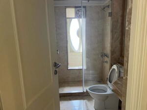Bathroom in 3 BHK Apartment at Hiranandani Gardens Valencia, Powai – for Rent
