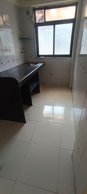 Kitchen in 1 BHK Apartment at Seawoods – for Sale