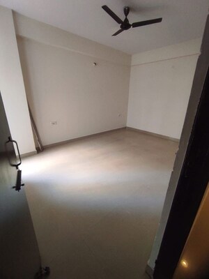 Room in 2 BHK Apartment at Charms Castle, Raj Nagar Extension – for Rent