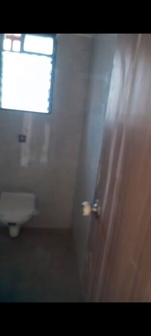 Bathroom in 2 BHK Apartment at Sadhana Bliss, Malad West – for Rent