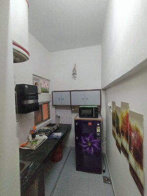 Kitchen in Studio Apartment at Defence Colony – for Rent
